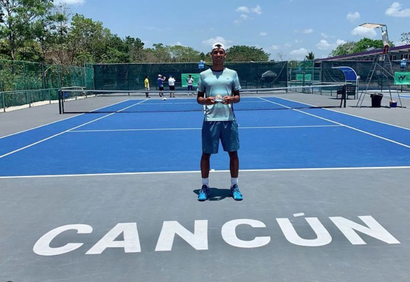 Luca H. tournament victory celebration — NMBA junior tennis success