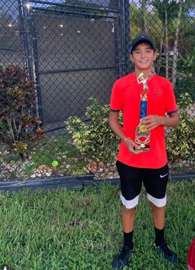 Stefan Karatosic with trophy — NMBA junior tennis tournament champion