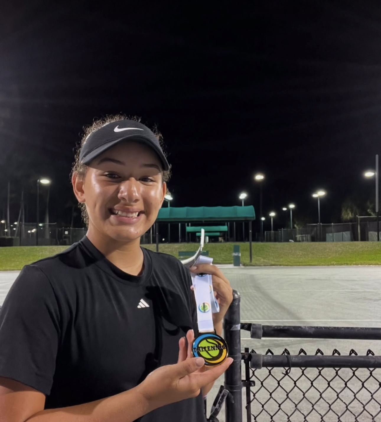 Michelle P. championship celebration — NMBA junior tennis success story