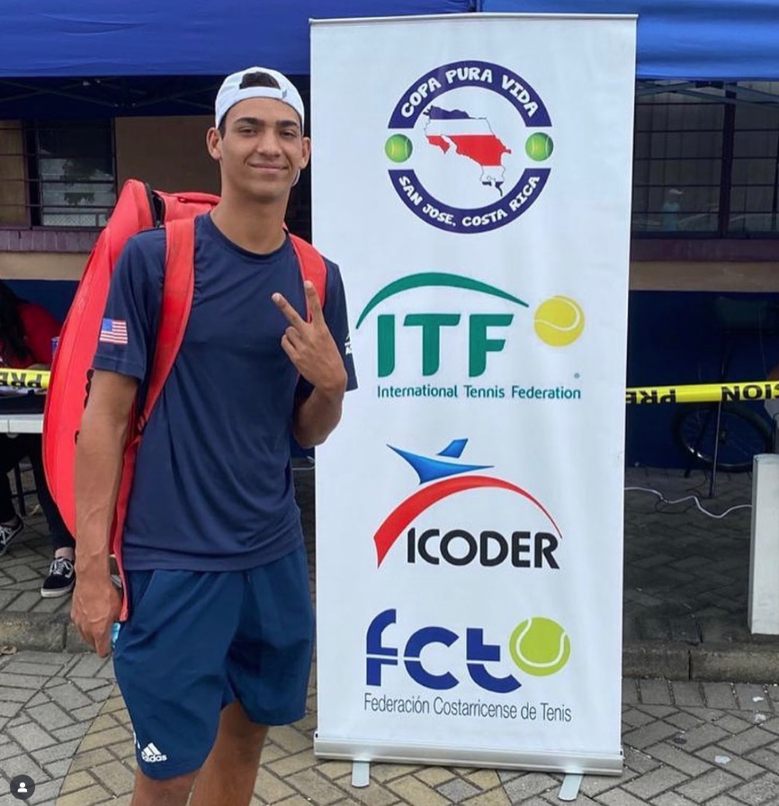 Luca Hotze celebrating ITF Junior World title — NMBA tennis champion