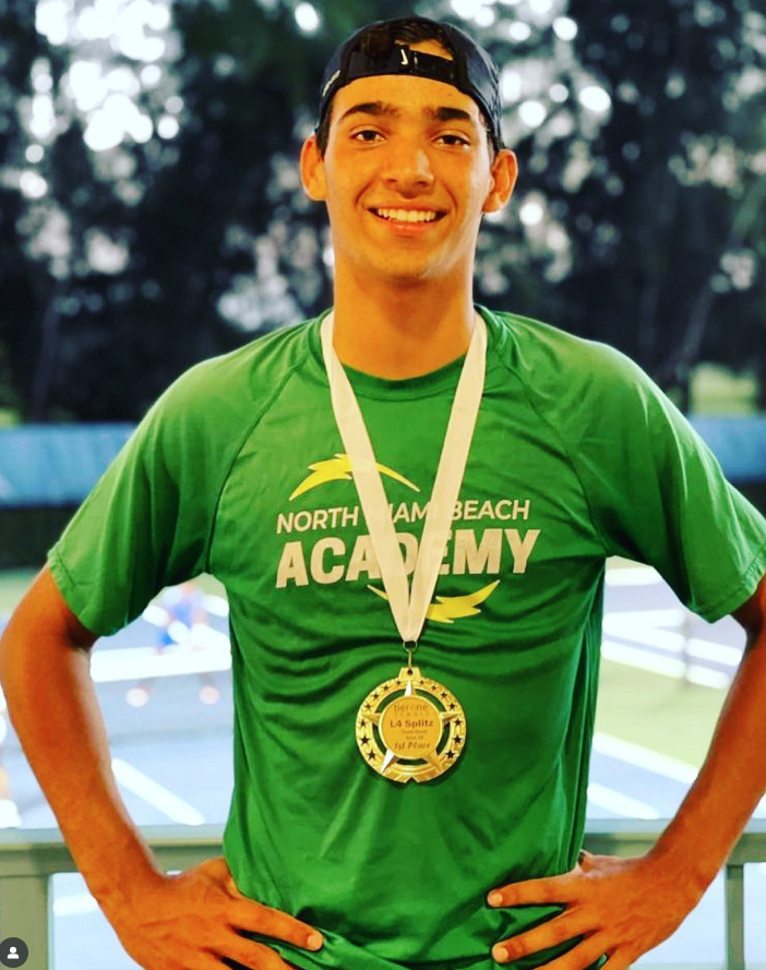 Luca Hotze championship celebration — NMBA elite junior tennis player